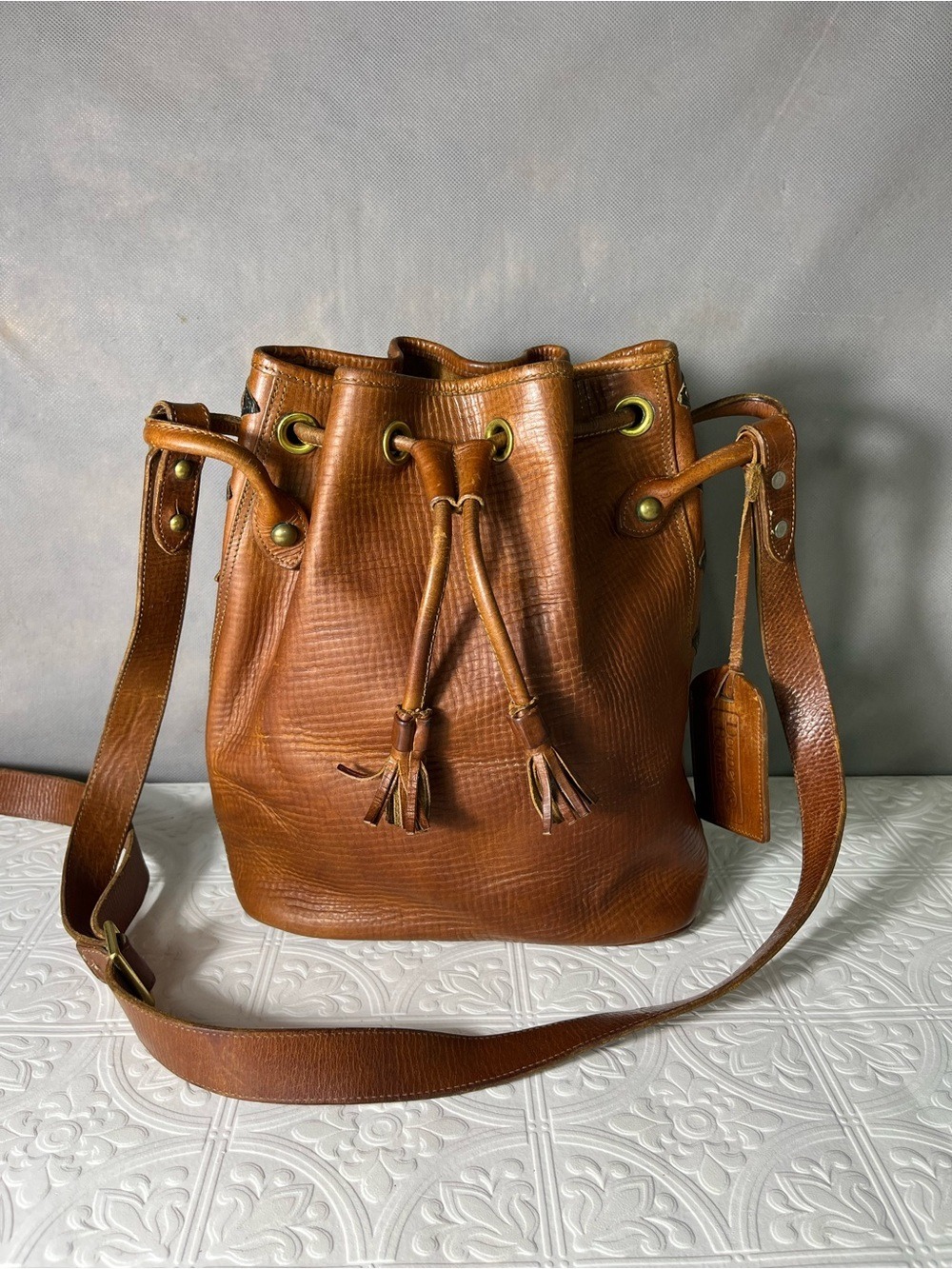 Vintage Dooney & Bourke Aztec Teton Leather Drawstring Bucket Crossbody Bag